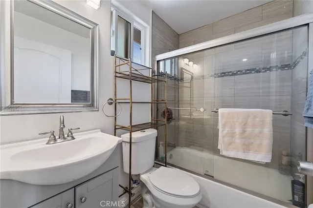 a view of a patio with table and chairs