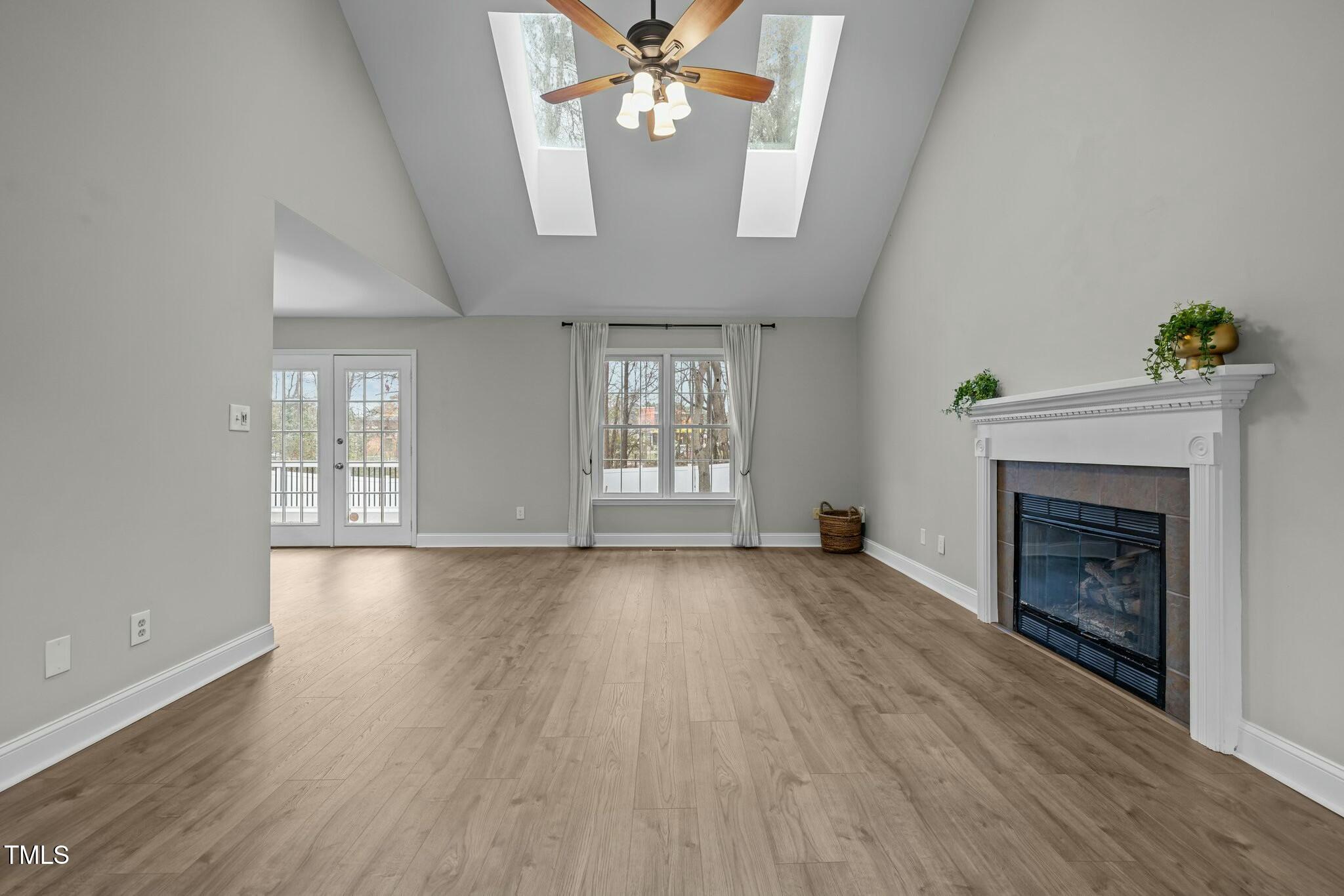 8304 Bellingham Circle Raleigh, NC 27615 - Photo 9 of 47 Family Room with Skylights