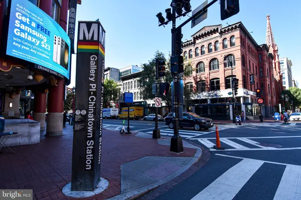 a view of a building with sitting area