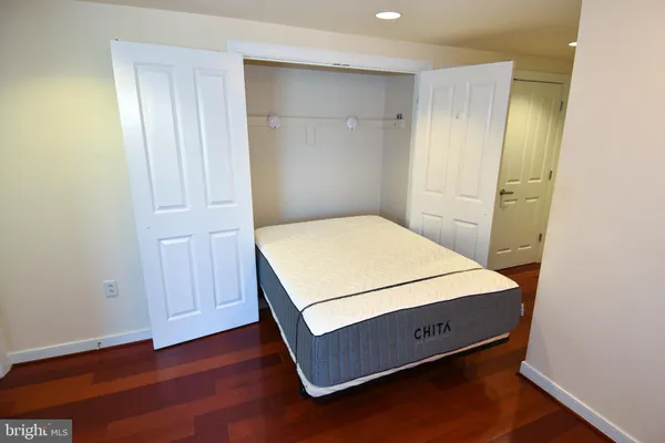 a room with a bed and a table