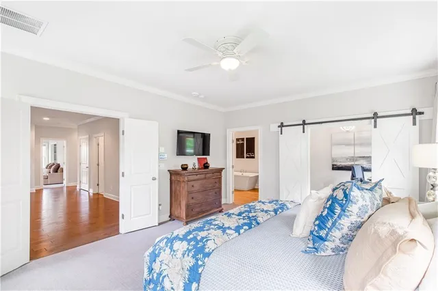 a bathroom with a tub sink and shower