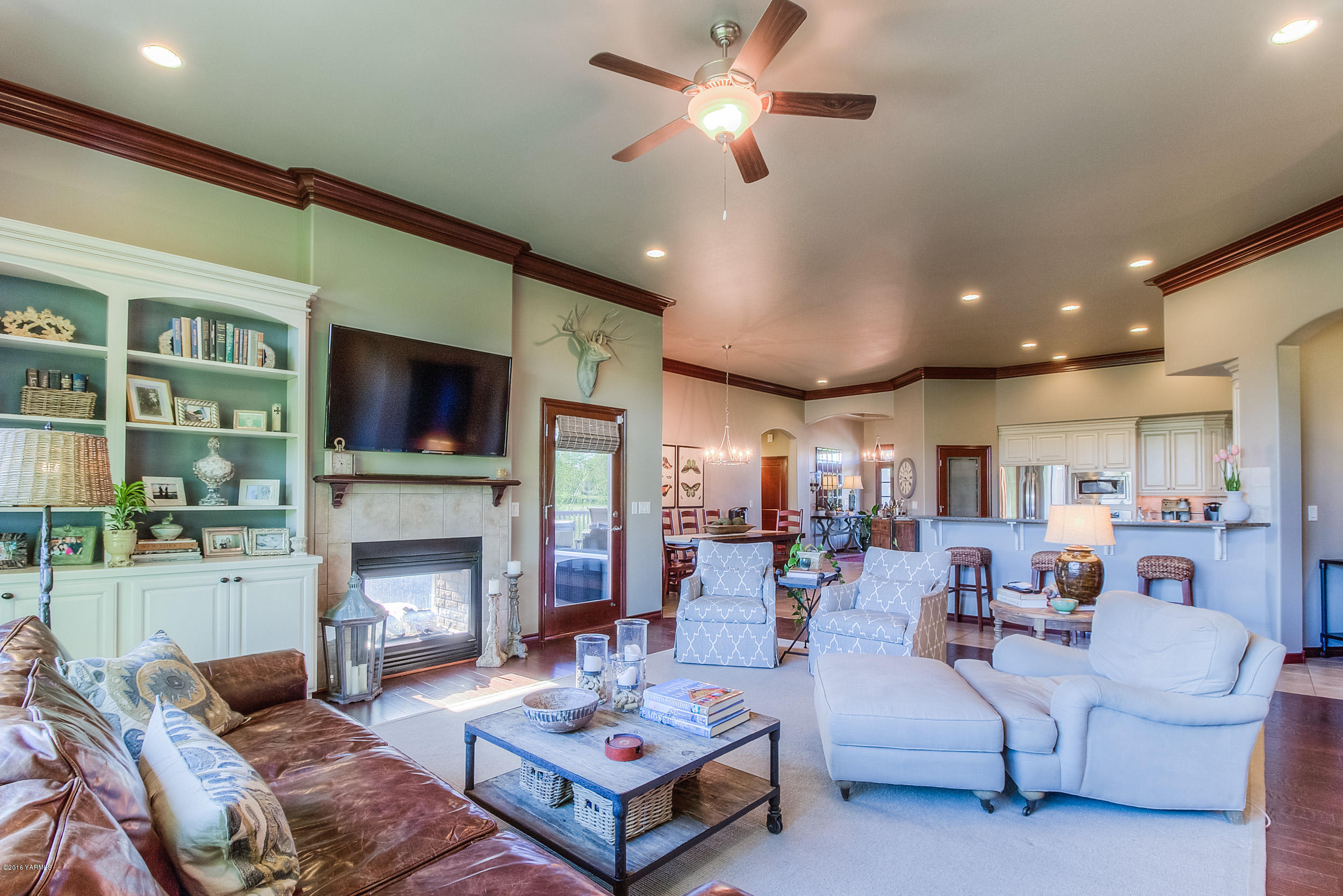 8970 Coolidge Road Yakima, WA 98903 - Photo 24 of 60 a living room with fireplace furniture and a fireplace