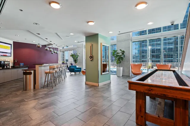 a kitchen with a table and chairs in it