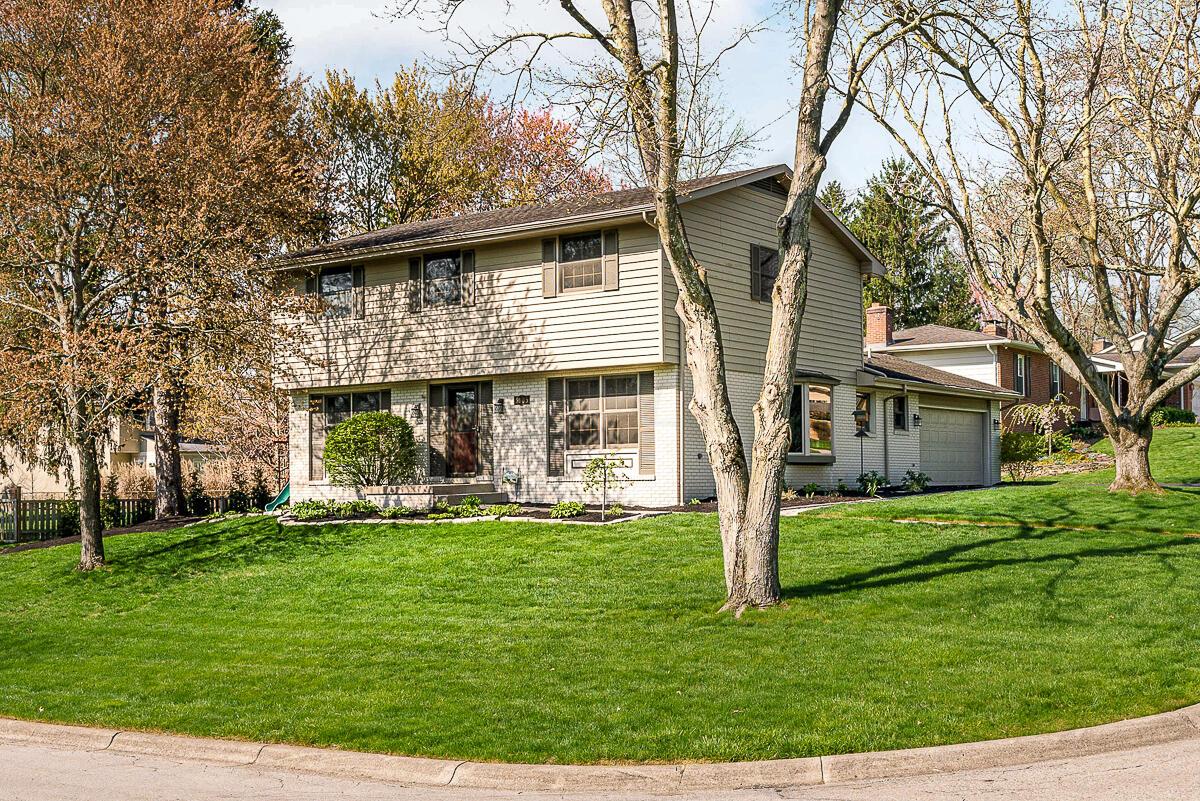 5905 Litchfield Road Columbus, OH 43235 - Photo 1 of 39 Perched nicely on a hill on a corner lot with mature trees