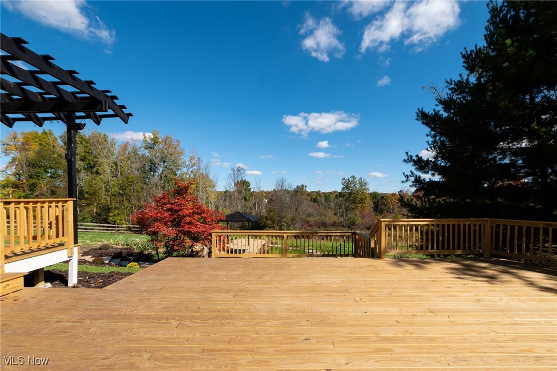 13295 Sperry Road Chesterland, OH 44026 - Photo 29 of 35 Wooden terrace with a pergola