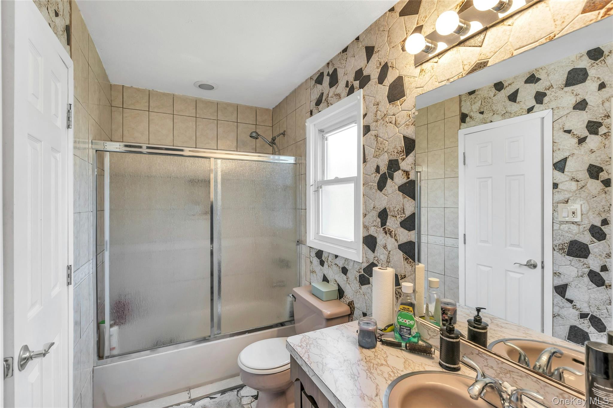 639 Townline Road Hauppauge, NY 11788 - Photo 18 of 28 a bathroom with a sink toilet and shower