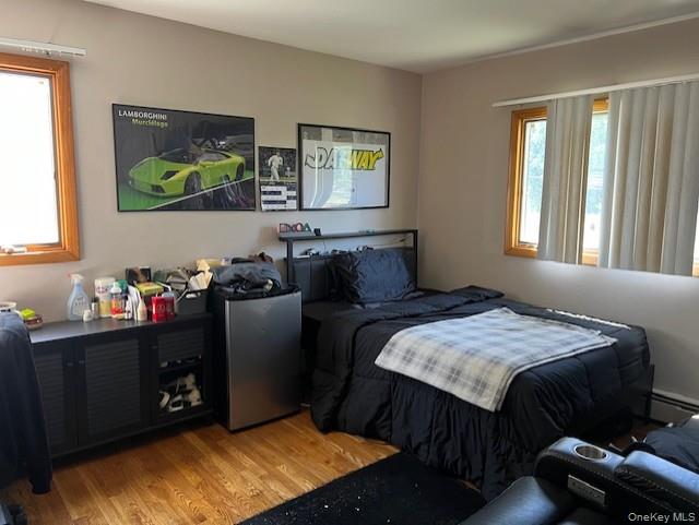 639 Townline Road Hauppauge, NY 11788 - Photo 25 of 28 a bedroom with a bed and a window