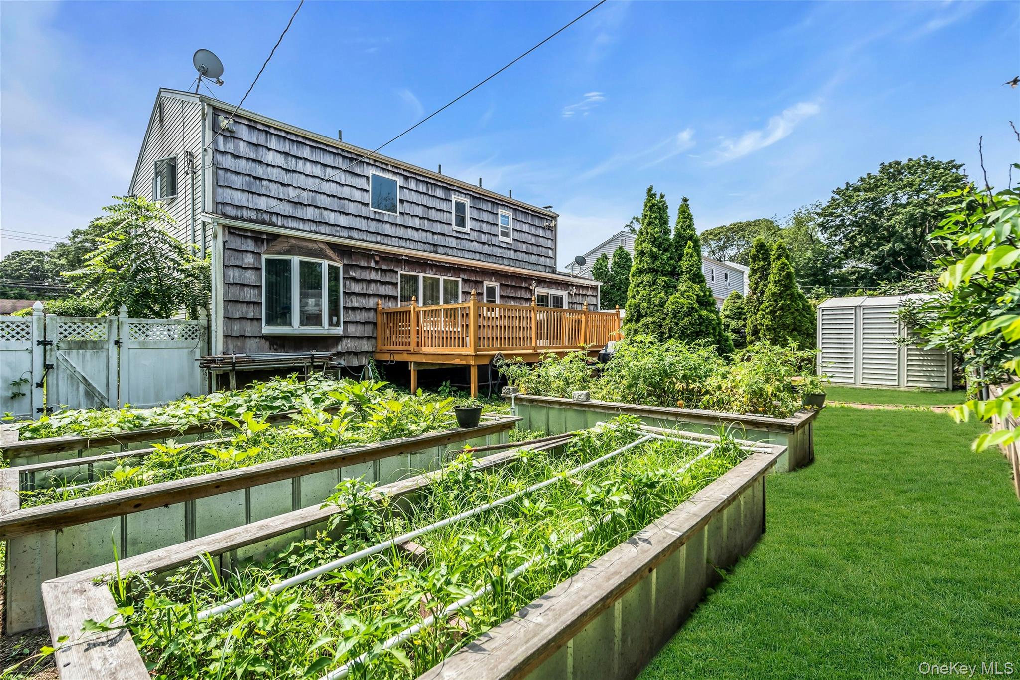 639 Townline Road Hauppauge, NY 11788 - Photo 5 of 28 front view of a house with a yard