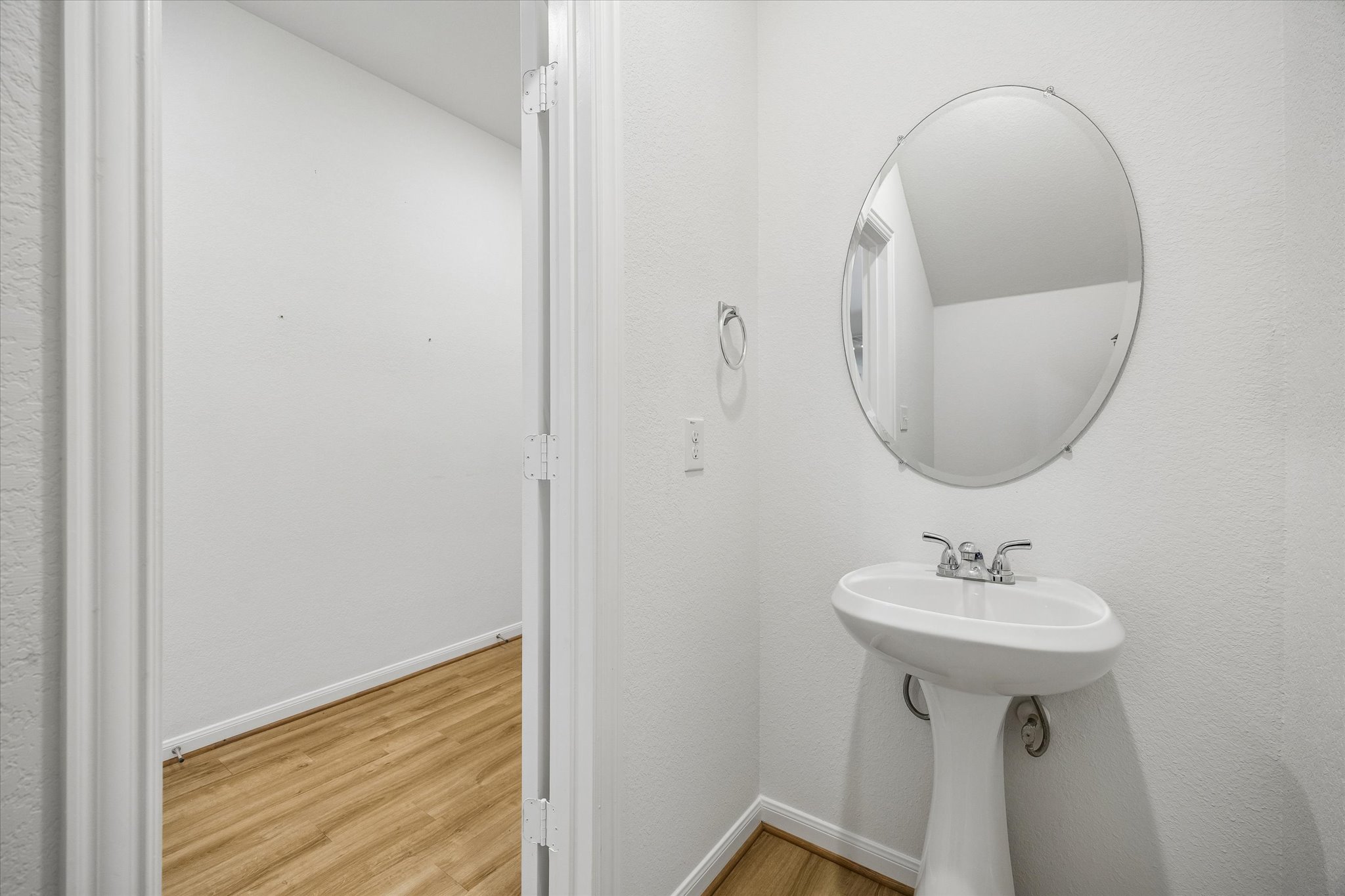 157 LT Rusty Drive Jarrell, TX 76537 - Photo 30 of 39 Bathroom with light wood-style floors and baseboards