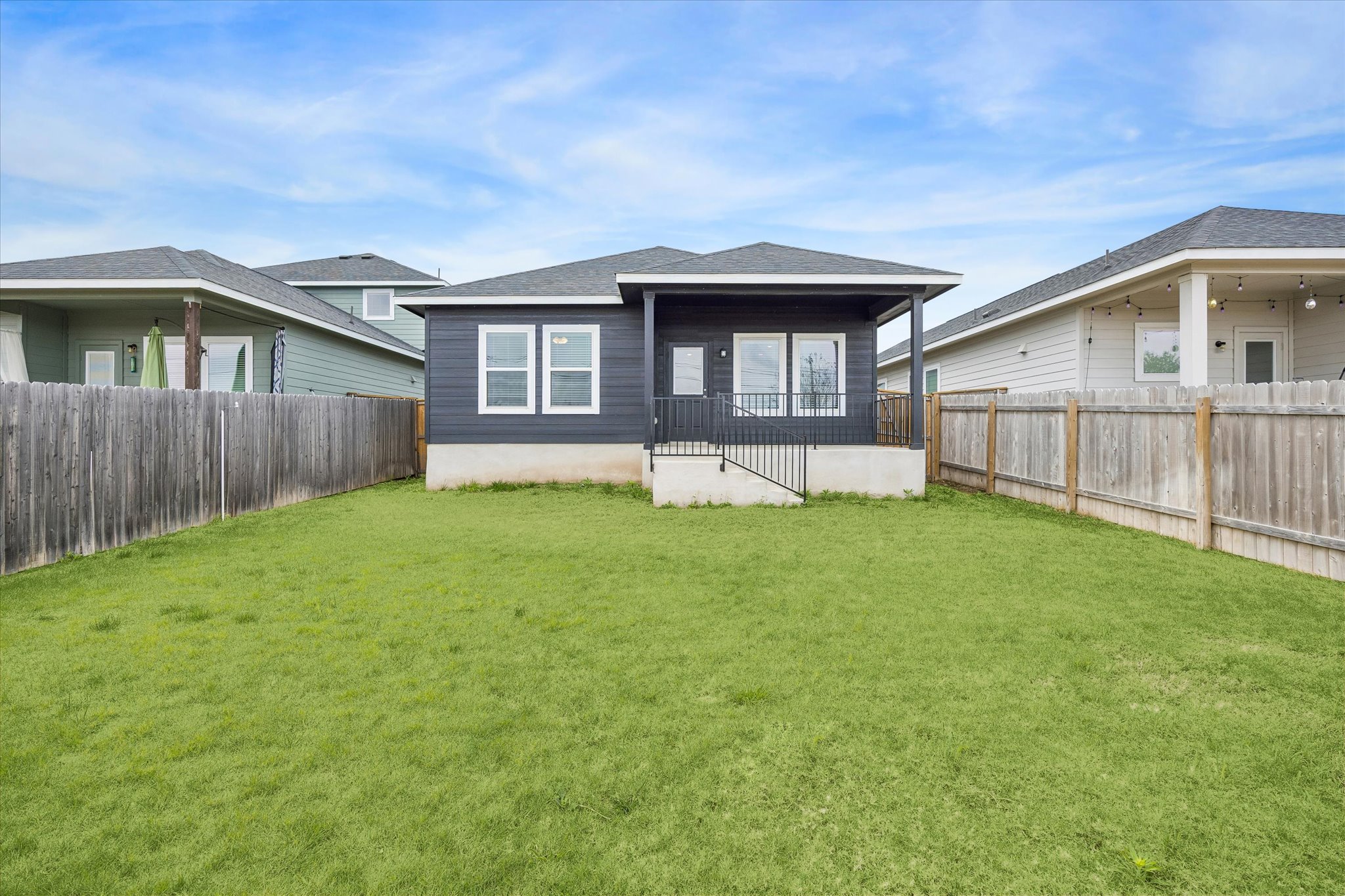 157 LT Rusty Drive Jarrell, TX 76537 - Photo 36 of 39 Back of property featuring a fenced backyard