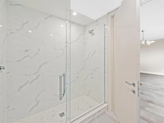 a view of an empty room with a balcony