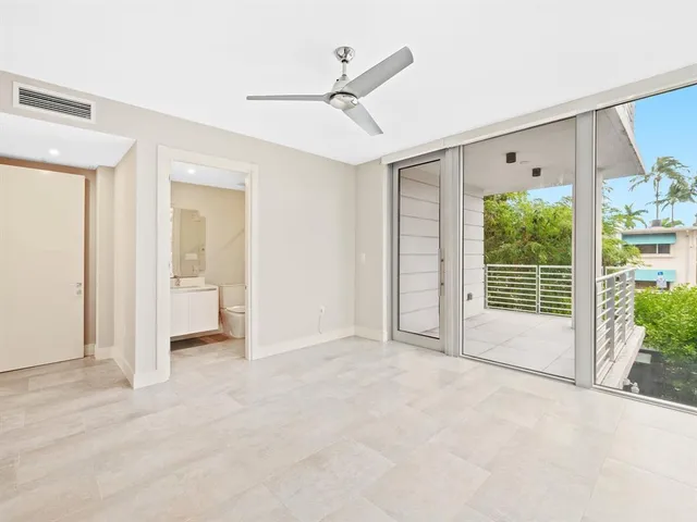 a view of a balcony with plants