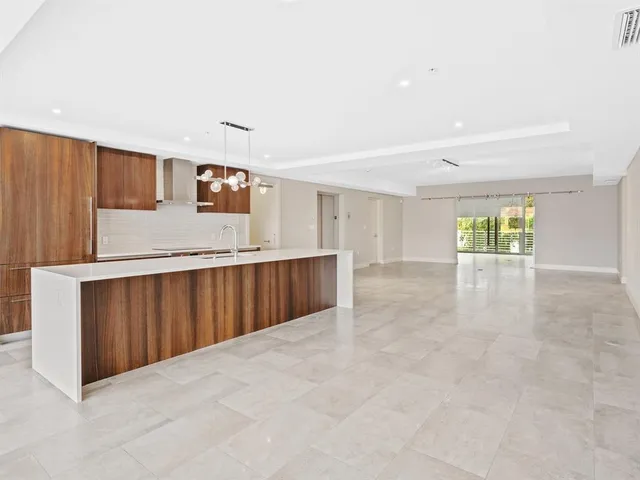 a view of a kitchen with a sink