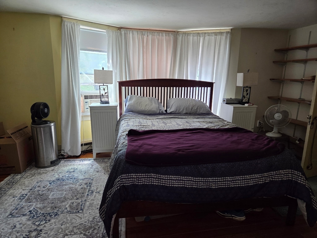 920 Worcester Road Barre, MA 01005 - Photo 24 of 40 a bedroom with a bed and cabinets