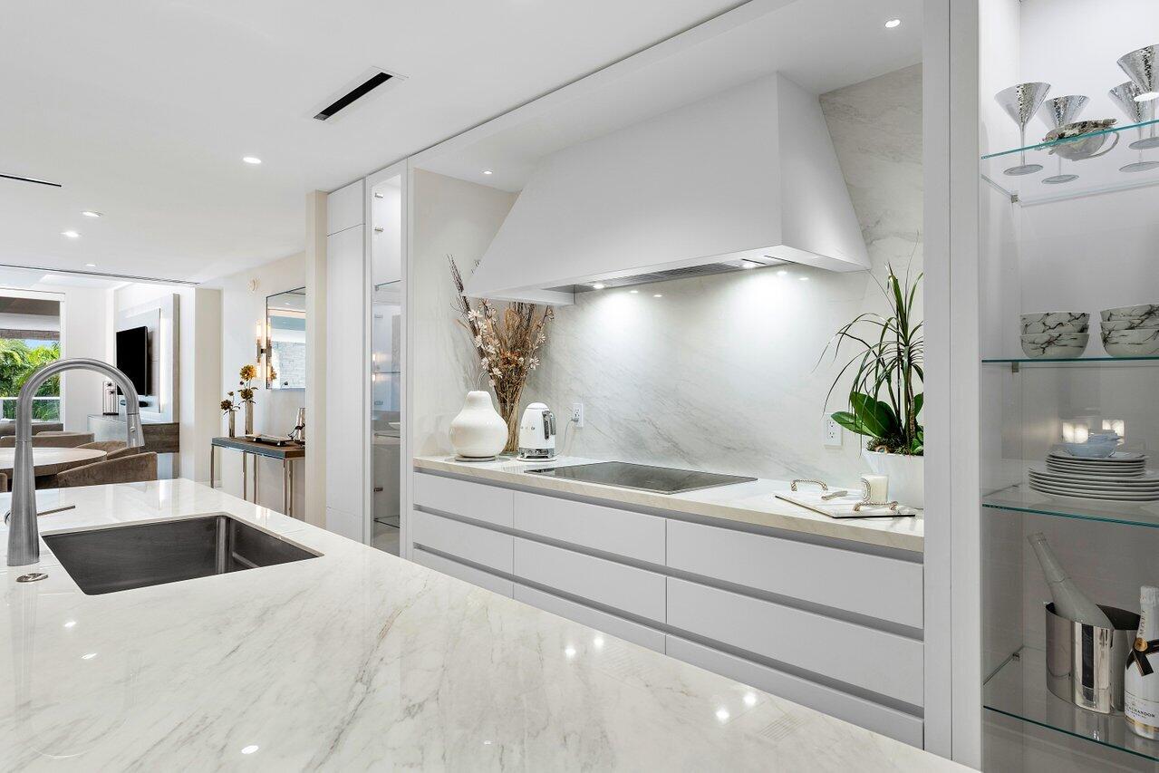 200 Southeast Mizner Boulevard, Unit 307 Boca Raton, FL 33432 - Photo 8 of 74 White Stone Countertops w/Sculpted Hood