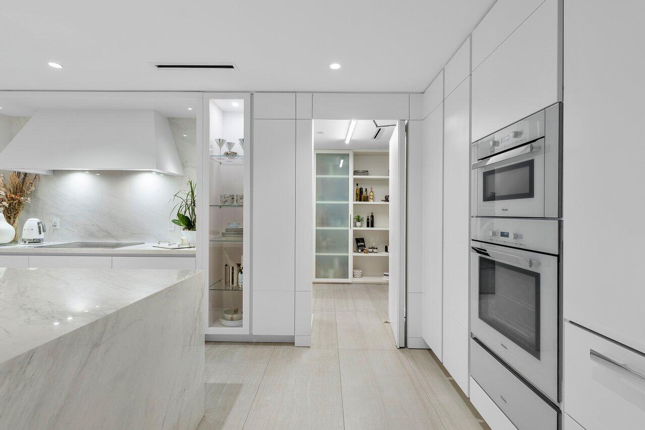200 Southeast Mizner Boulevard, Unit 307 Boca Raton, FL 33432 - Photo 10 of 74 Open Pantry Doorway