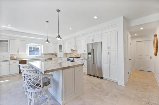 a large kitchen with lots of counter space and appliances