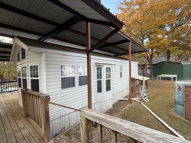 6435 FM 17 Yantis, TX 75497 - Photo 14 of 22 a view of a house with wooden deck and furniture