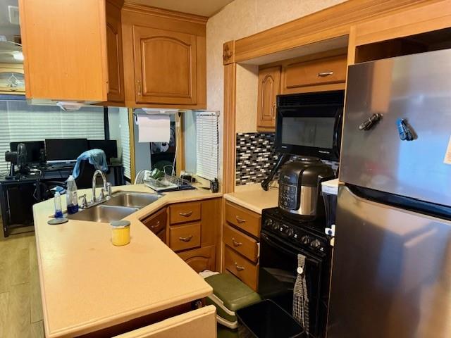 6435 FM 17 Yantis, TX 75497 - Photo 19 of 22 a kitchen with a sink appliances and cabinets
