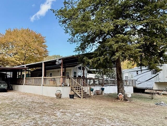 6435 FM 17 Yantis, TX 75497 - Photo 2 of 22 a view of a bike garage with a bench