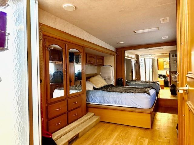 6435 FM 17 Yantis, TX 75497 - Photo 22 of 22 a spacious bathroom with a granite countertop sink and a mirror