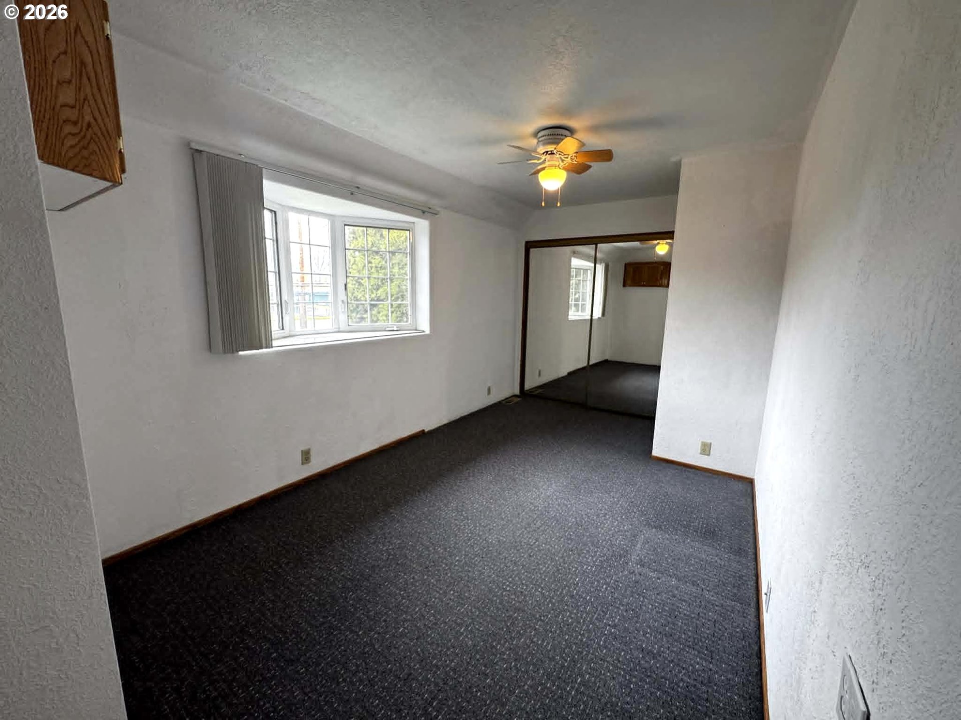 1920 Cliff Street Baker City, OR 97814 - Photo 20 of 34 a view of an empty room with a window