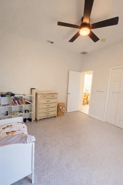 2009 Meadow Rue Court Trinity, FL 34655 - Photo 12 of 21 a view of a livingroom with storage and utility