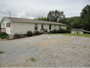 119 Max Jett Road Johnson City, TN 37601 - Photo 18 of 20 back of home with ample parkin