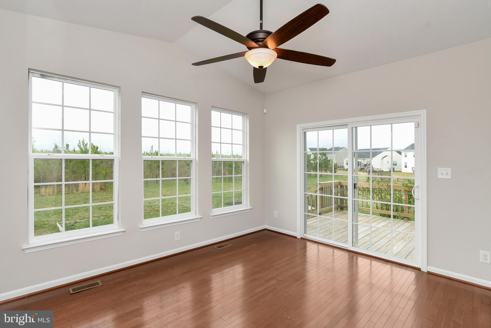 5329 Longbow Road King George, VA 22485 - Photo 14 of 43 Breakfast Area with Walk Out to Back Deck