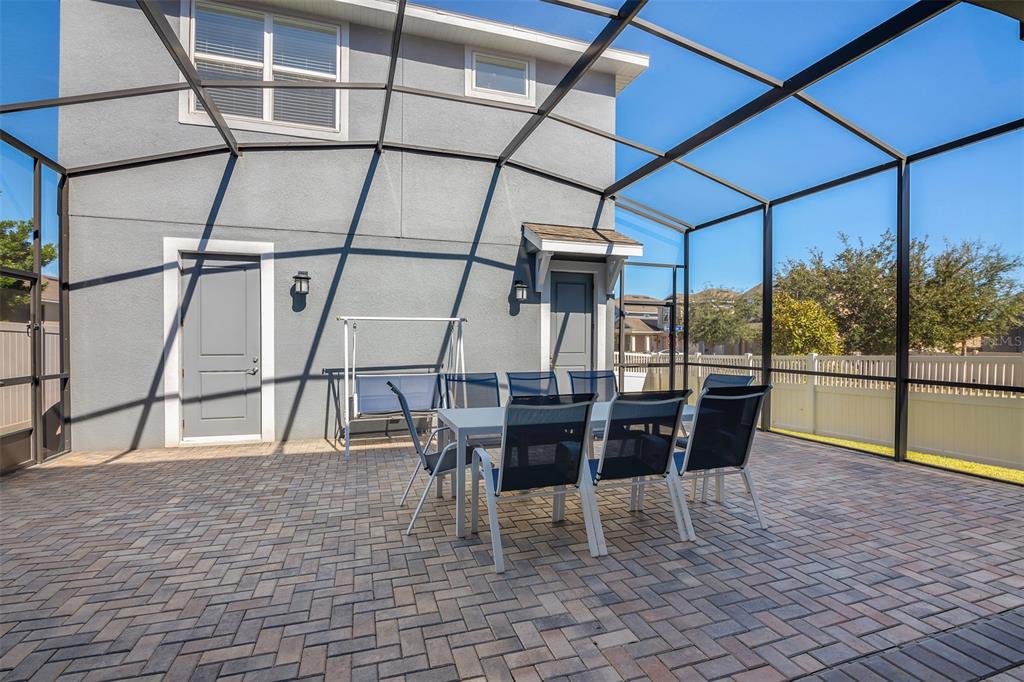 15807 Sweet Lemon Way Winter Garden, FL 34787 - Photo 12 of 35 a view of a dining room with furniture window and wooden floor