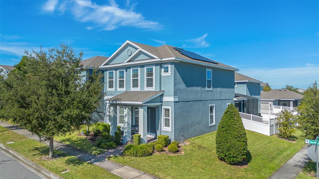 15807 Sweet Lemon Way Winter Garden, FL 34787 - Photo 2 of 35 a front view of a house with a yard