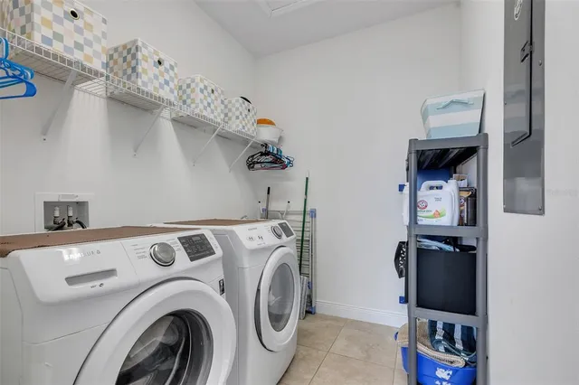 a utility room with dryer and washer