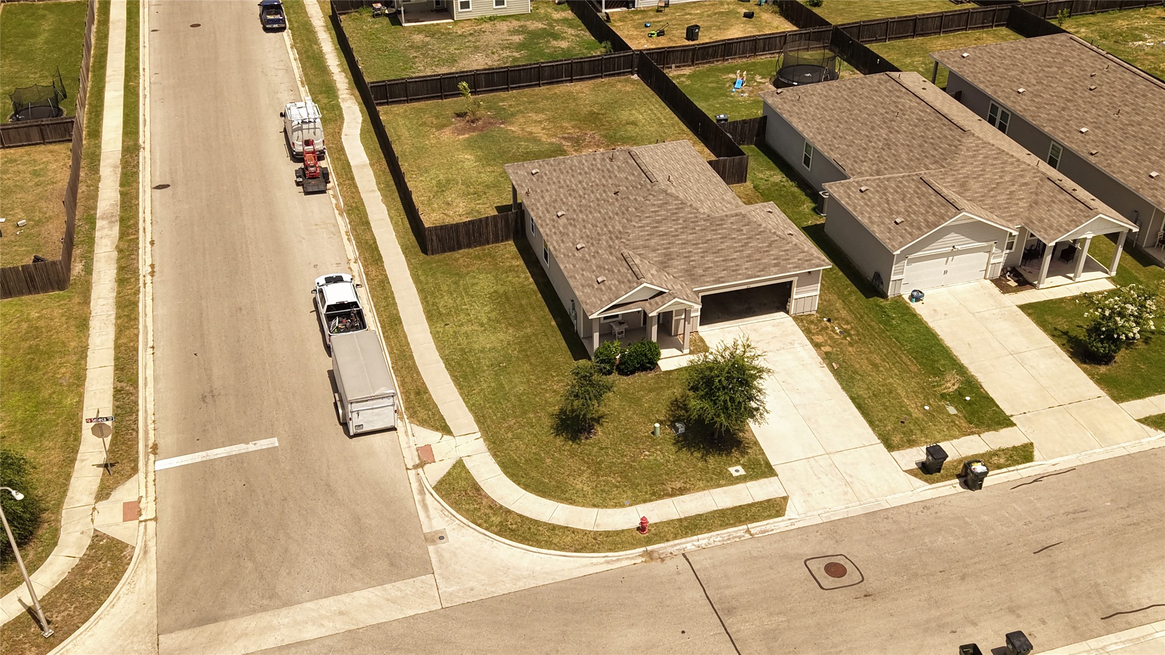 250 Seneca Loop Kyle, TX 78640 - Photo 21 of 22 An aerial perspective showcases the inviting facade and ample yard space of this charming residence.