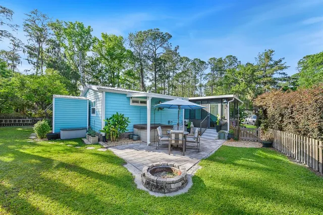 a view of a backyard with garden