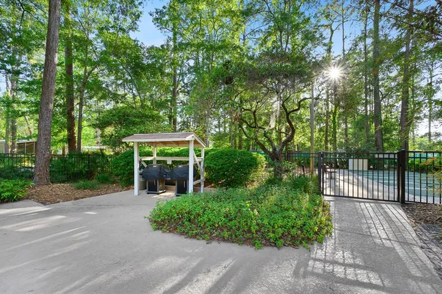 a view of backyard with green space