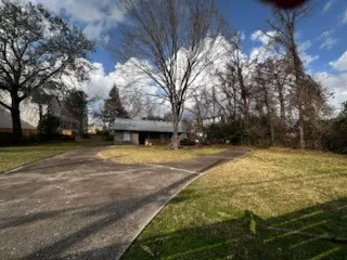 a view of backyard with outdoor space
