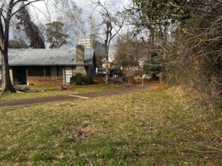1235 West 25th Street Houston, TX 77008 - Photo 3 of 8 a view of a house with backyard