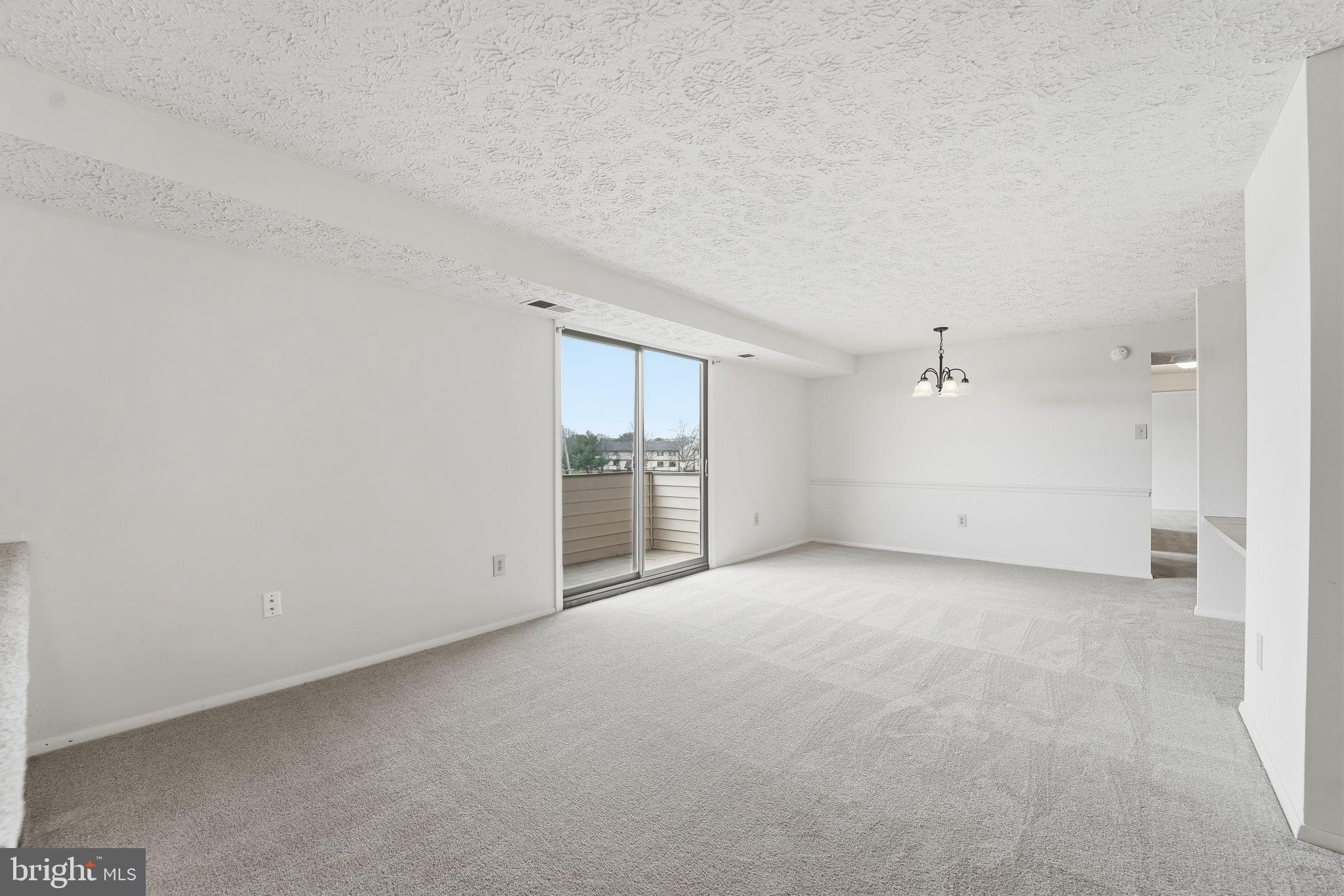 997 Heather Ridge Drive, Unit 3G Frederick, MD 21702 - Photo 3 of 14 an empty room with windows