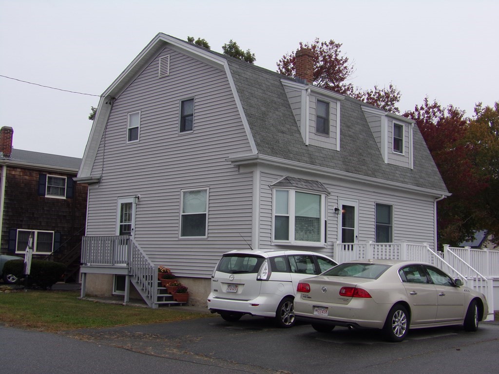 74 James Street Acushnet, MA 02743 - Photo 1 of 41 a view of a car park in front of house