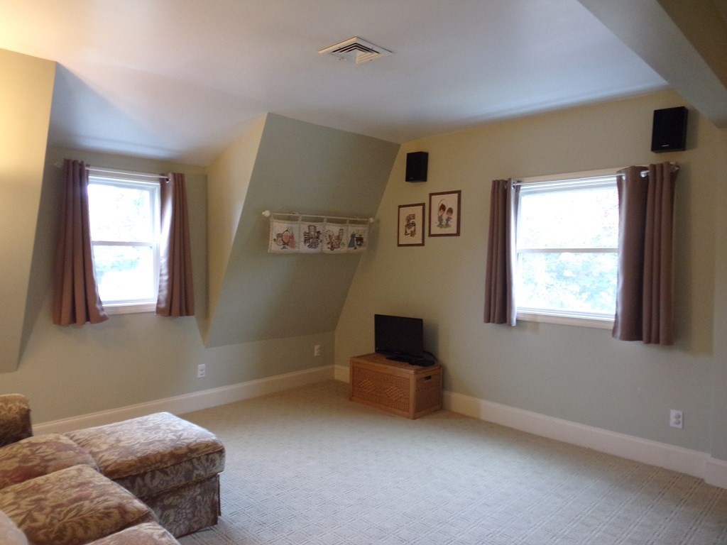 74 James Street Acushnet, MA 02743 - Photo 15 of 41 a bedroom with furniture and window