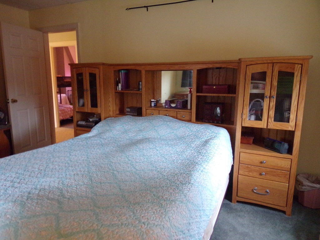74 James Street Acushnet, MA 02743 - Photo 23 of 41 a bedroom with a bed and furniture
