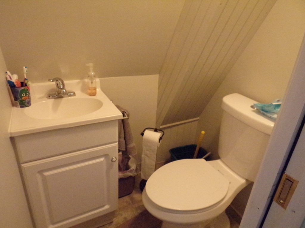 74 James Street Acushnet, MA 02743 - Photo 26 of 41 a bathroom with a sink and a toilet