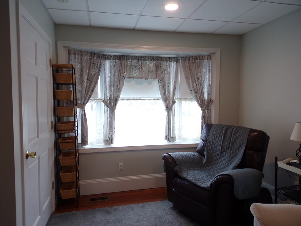 74 James Street Acushnet, MA 02743 - Photo 27 of 41 a living room with furniture and a window