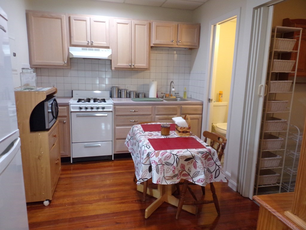 74 James Street Acushnet, MA 02743 - Photo 37 of 41 a bedroom with a bed and a chair in it