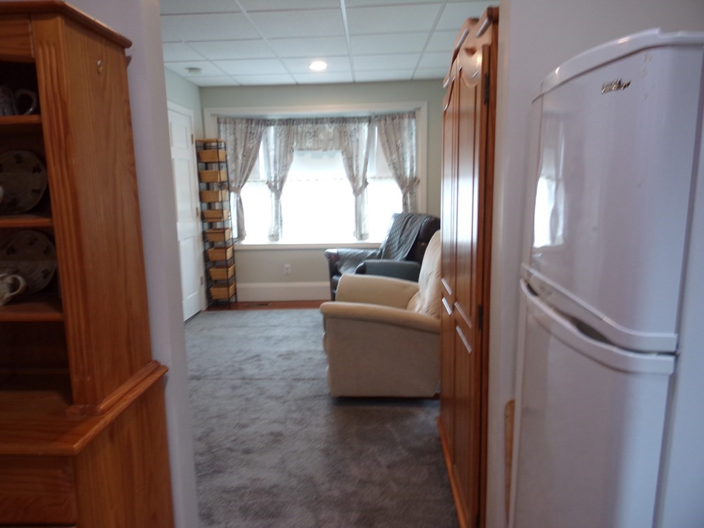 74 James Street Acushnet, MA 02743 - Photo 41 of 41 a living room with furniture and a large window