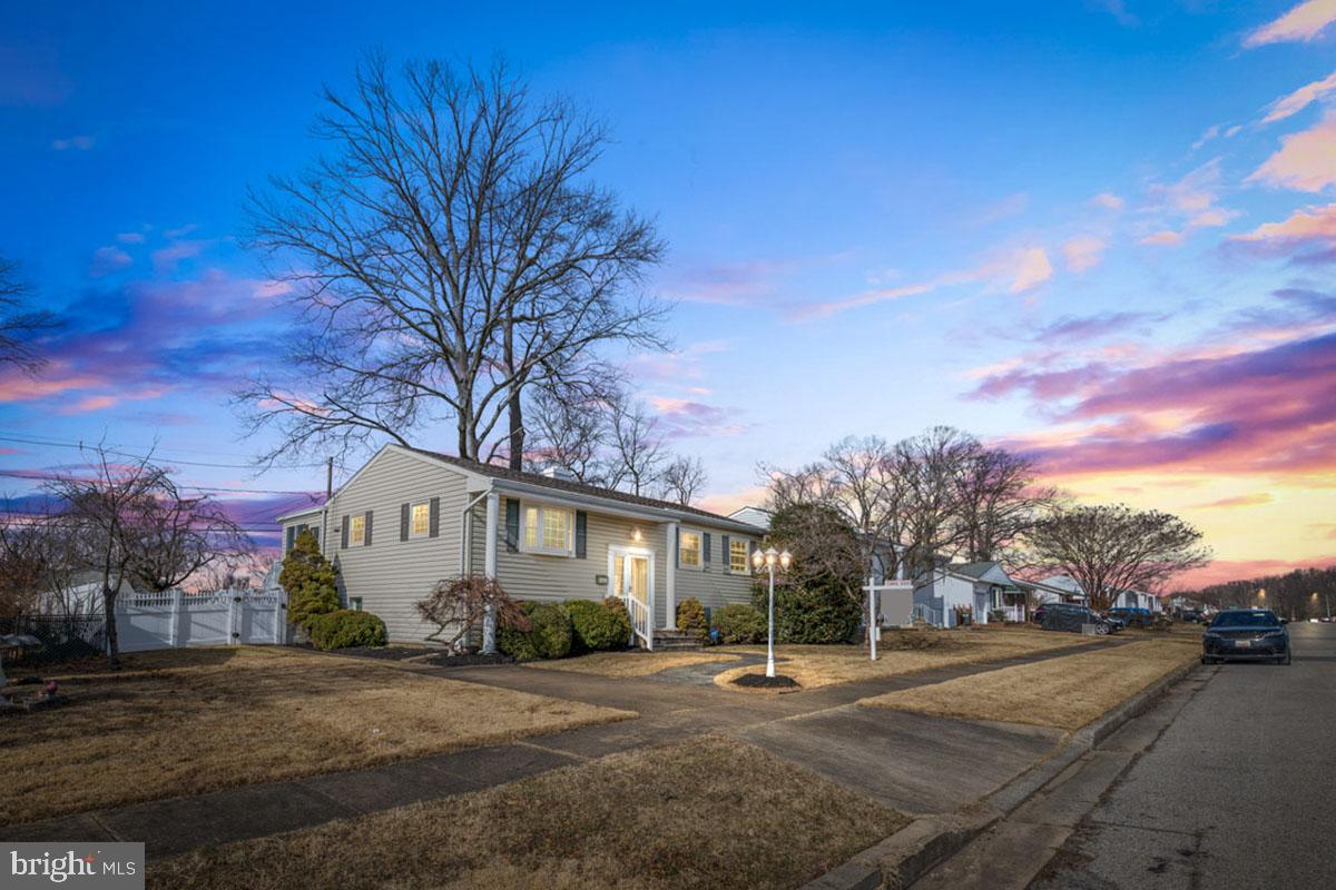 516 Nollmeyer Road Baltimore, MD 21220 - Photo 2 of 67 a front view of a house with a yard and trees