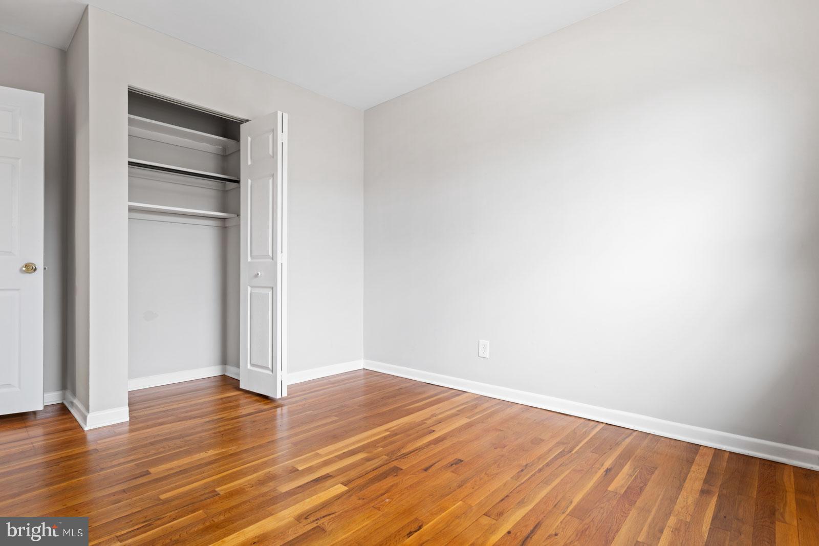 516 Nollmeyer Road Baltimore, MD 21220 - Photo 41 of 67 a view of an empty room with wooden floor