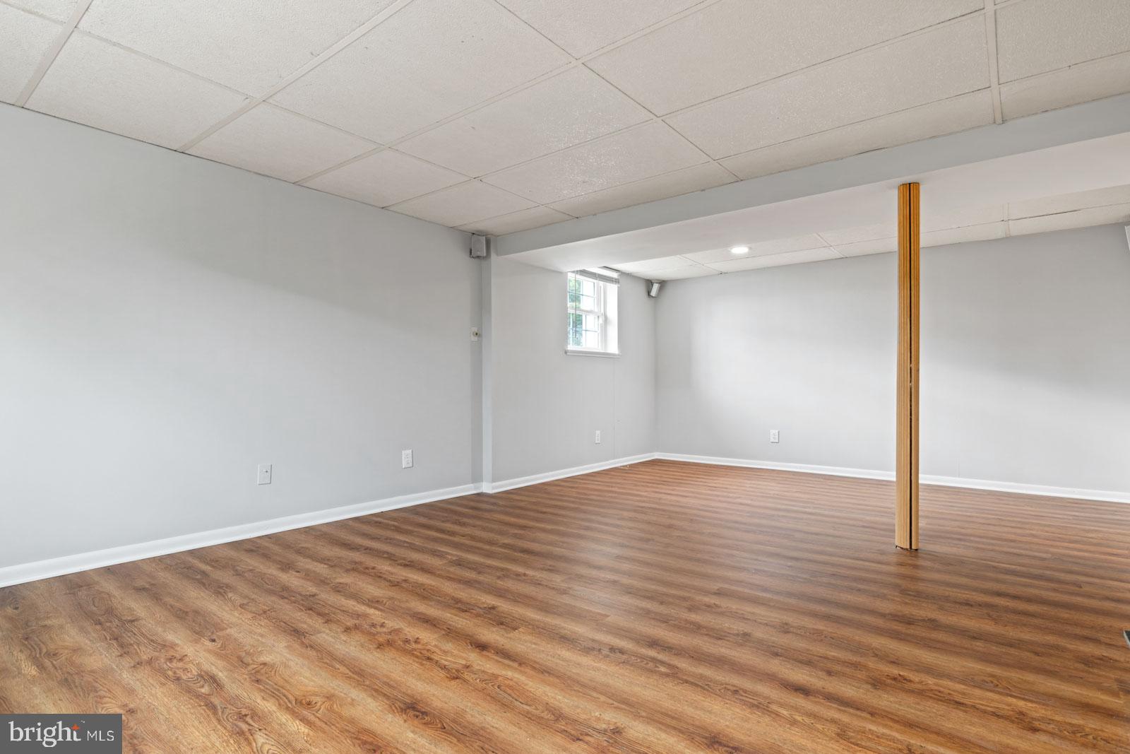 516 Nollmeyer Road Baltimore, MD 21220 - Photo 47 of 67 a view of empty room with wooden floor