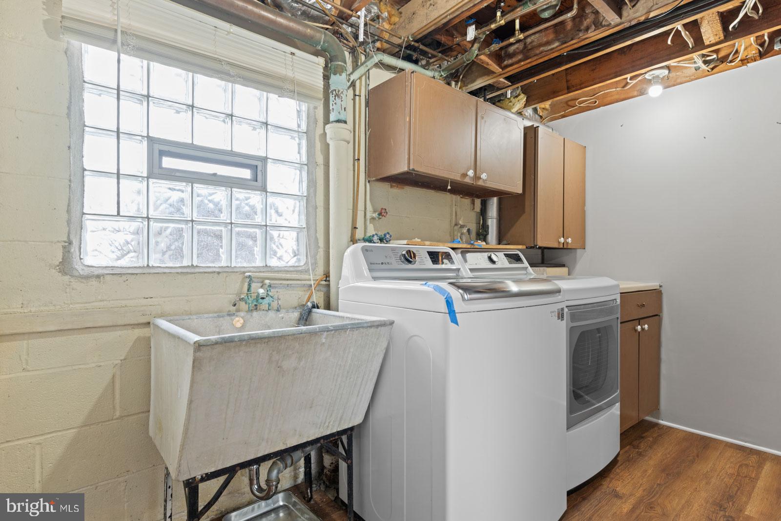 516 Nollmeyer Road Baltimore, MD 21220 - Photo 54 of 67 a utility room with stainless steel appliances granite countertop a stove a sink and a microwave