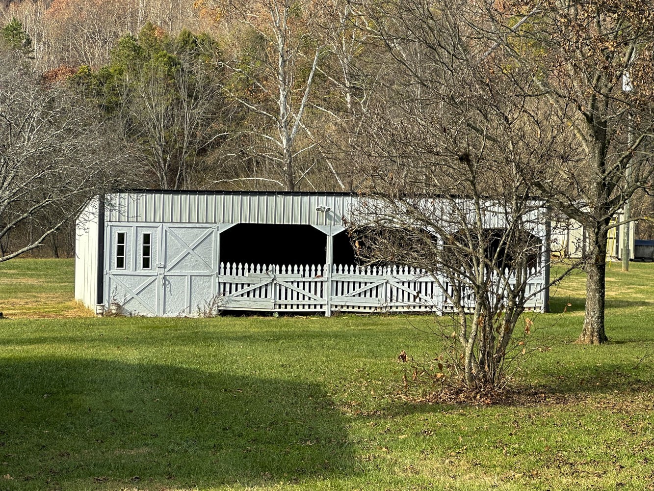 2641 Stanley Valley Road Surgoinsville, TN 37873 - Photo 22 of 26 a view of a big yard with large trees